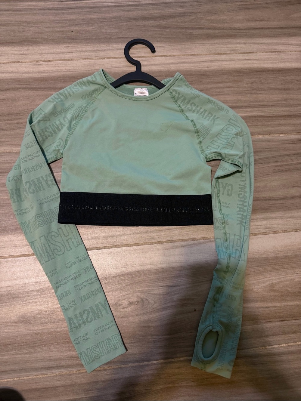 Gymshark Sage Green Long Sleeve Cropped Top with Black Hem
